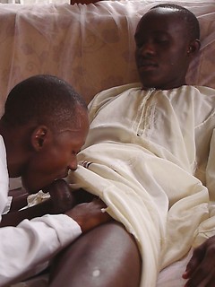 After a tribal ceremony, African twinks Patrick and Steven have a secret little bareback party. The get-together turns steamy when the boys start golden showers..